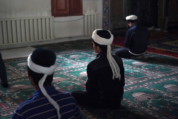 新疆穆斯林出国后亲人成人质